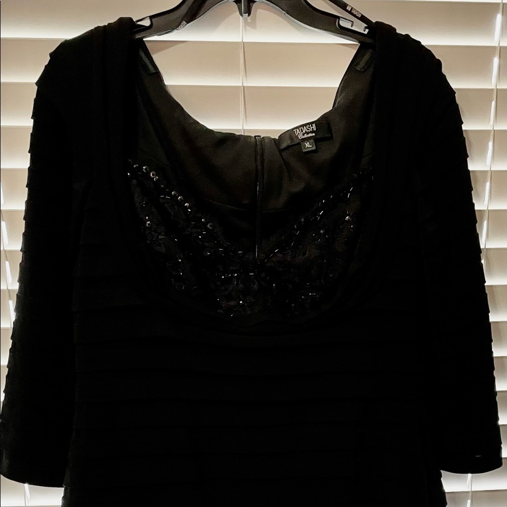 Black cocktail dress with beaded bodice